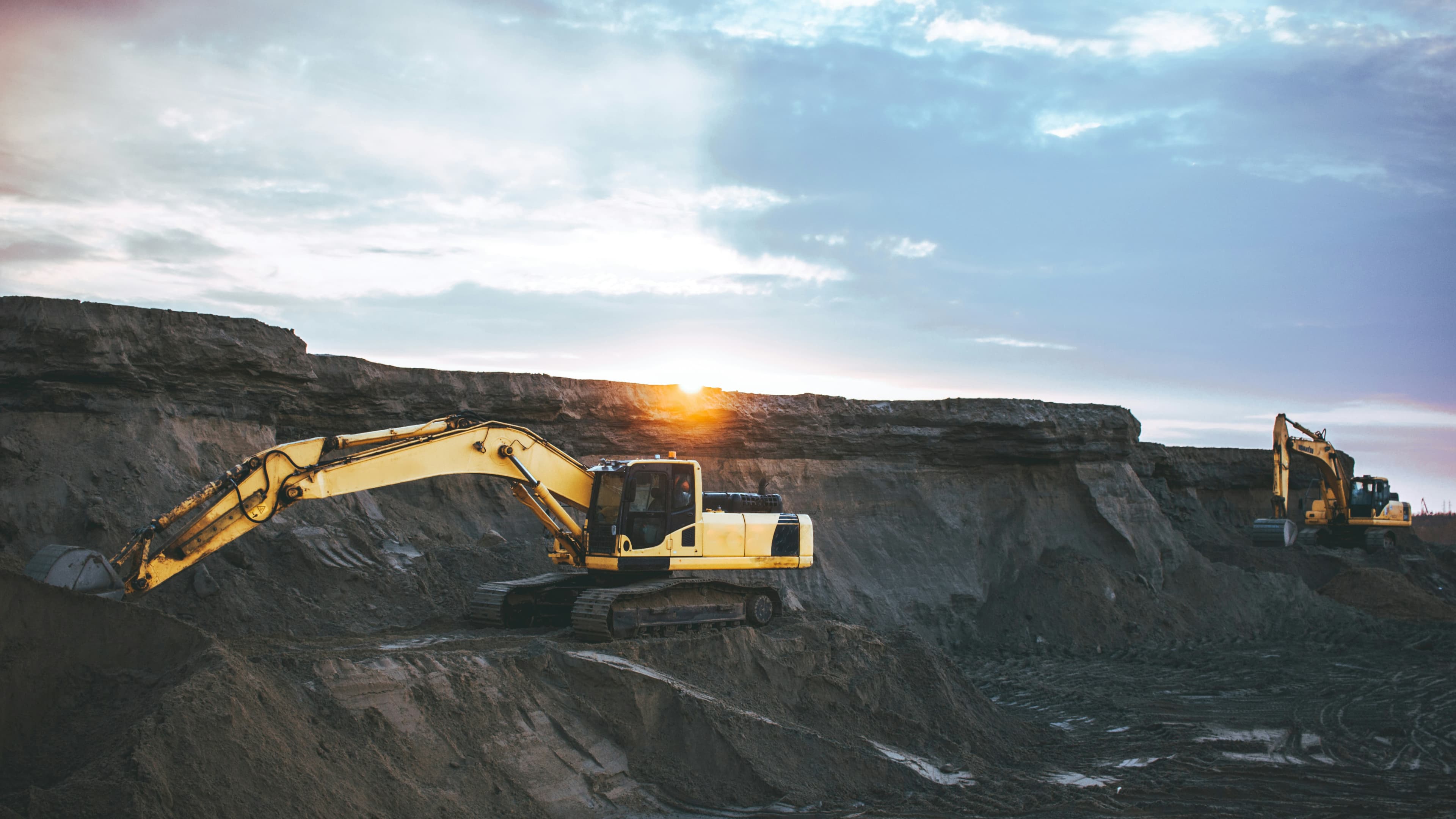 Dark aerial view of mining equipment from above